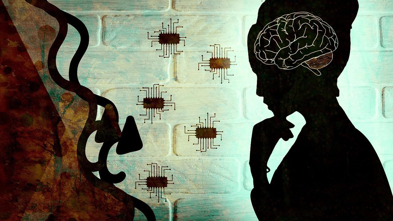 Egy nő sziluettjében kirajzolódik az agya, amire az előtte található mikrochipek csatlakoznak, hogy irányíthassa a technológiai eszközöket az agyhullámaival