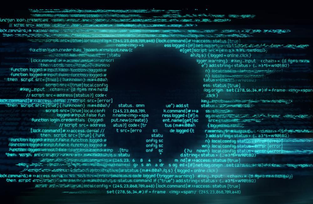 Online csalók számítógépes vírusa megtámadott egy rendszert, amely halálfejet jelenít meg az eszközön
