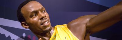Usain Bolt a győzelmi pózában